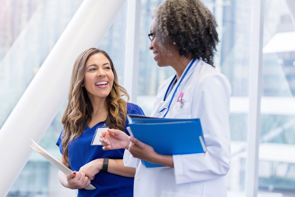 Doctor and a nurse conversing