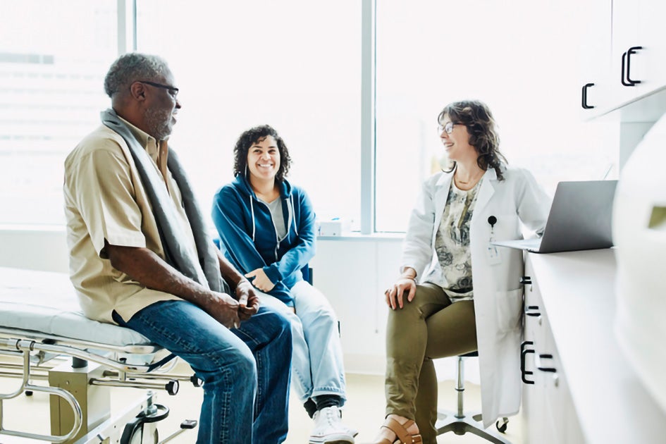 Nurse with a male and a female patient